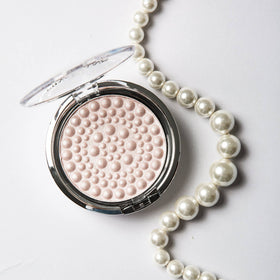 Physicians Formula swatched on skin demonstrating soft radiance and even tone benefit