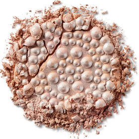 Physicians Formula close-up showing mineral pearl texture for smooth luminous finish