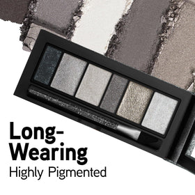 Physicians Formula palette beside coin showing compact travel-friendly size