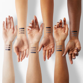 Physicians Formula three shade swatches on skin demonstrating pigmentation and shimmer