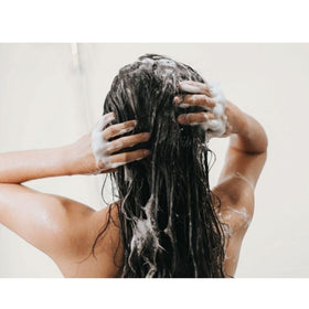 PHYTO PHYTOCYANE creamy foam texture on palm showing gentle lathering benefit