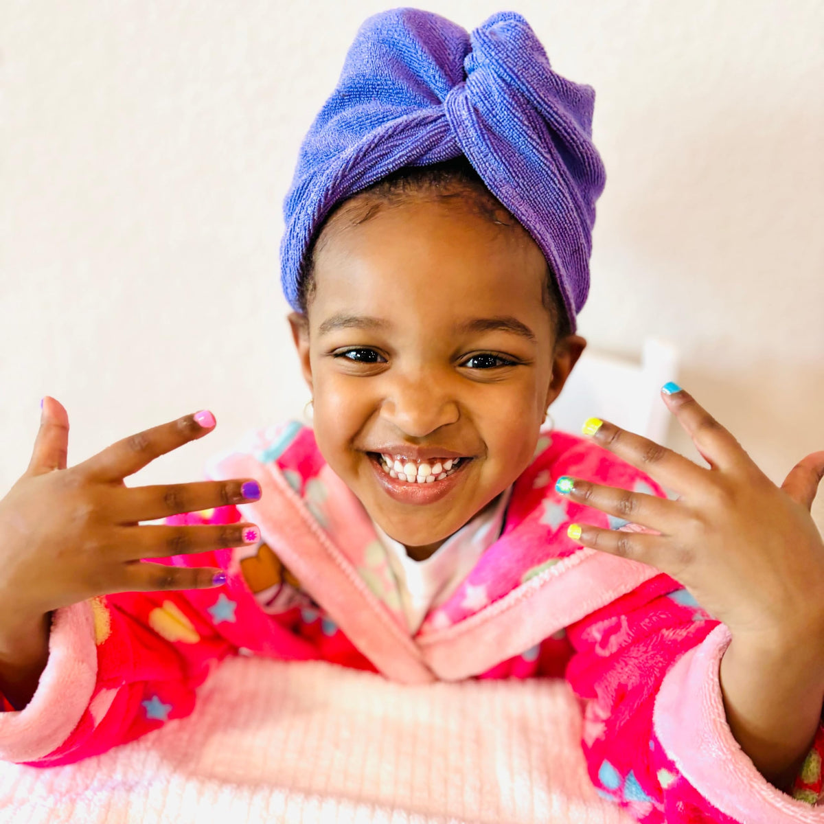 Piggy Paint application on child's nails demonstrating gentle polish and neat finish