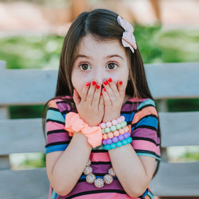 Piggy Paint application on child's nails demonstrating safe, vibrant finish