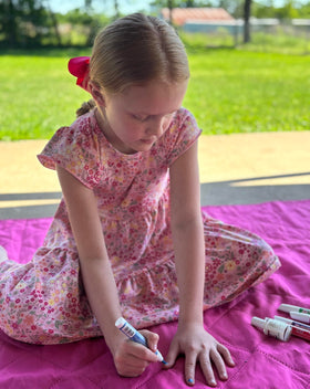 Piggy Paint label close-up highlighting non-toxic ingredients and safety benefits
