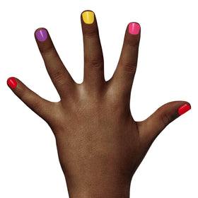 Piggy Paint brush applying polish to a child's nail showing smooth, easy application