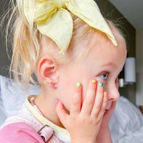 Piggy Paint stick-and-stay earrings shown separately to add playful accents