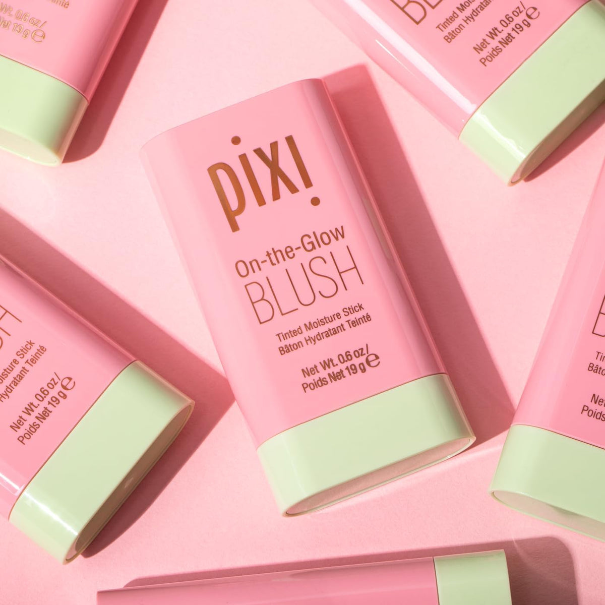 Pixi blush stick being applied to cheek for instant dewy glow