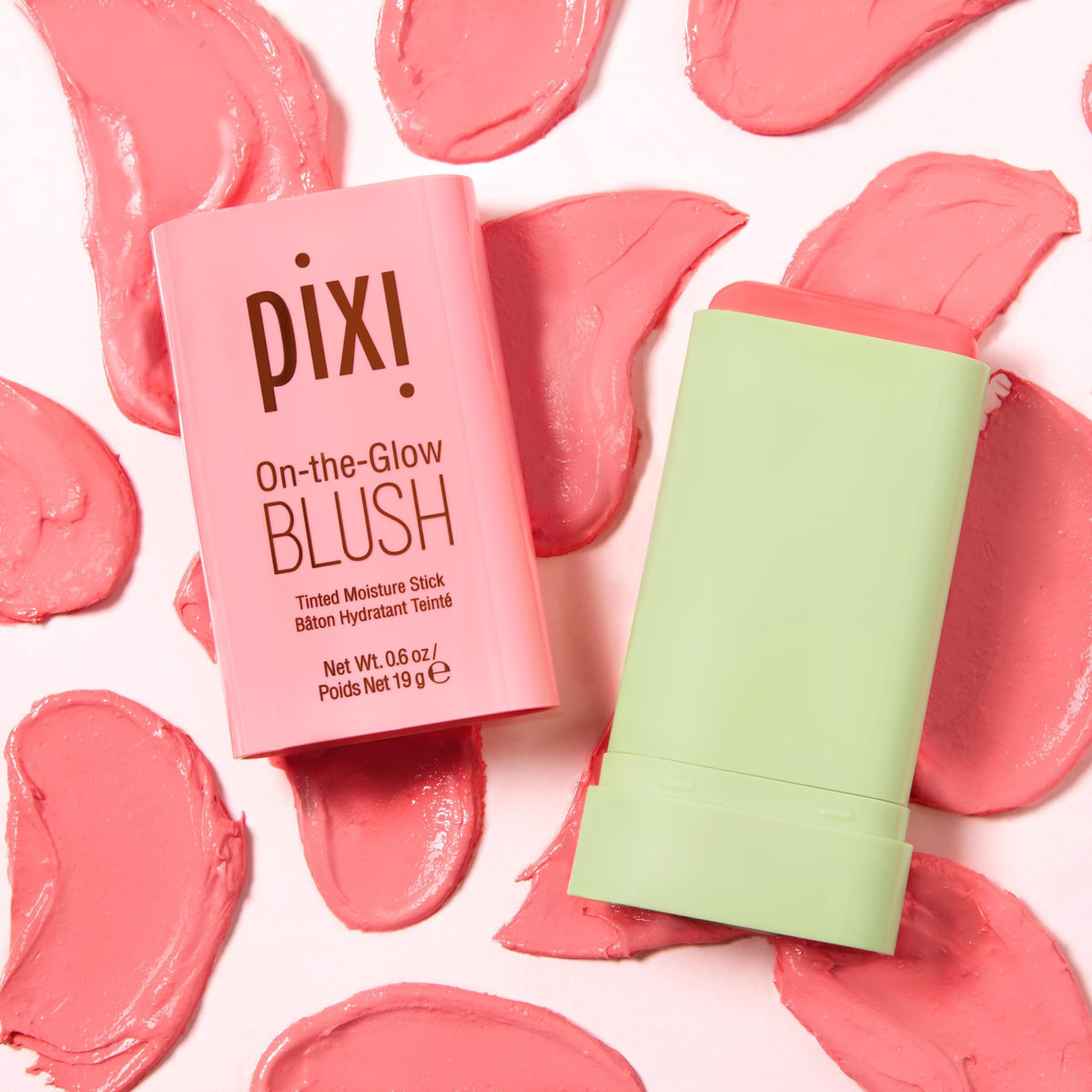 Pixi blush stick held in hand showing compact size and travel convenience