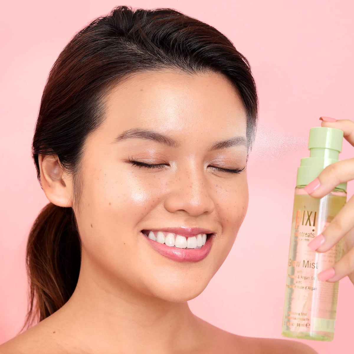 pixi droplet texture on skin demonstrating lightweight oil sheen and hydration