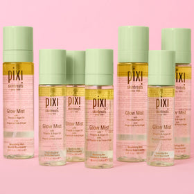 pixi placed with makeup tools illustrating use as setting spray and primer