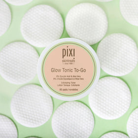 Pixi Glow Tonic open jar with stacked pads highlighting convenience and single-use hygiene
