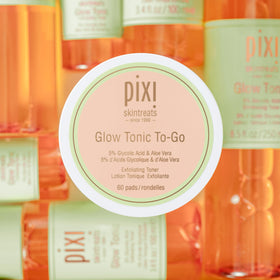 Pixi Glow Tonic pad in hand to show scale and easy one-step exfoliation on the go