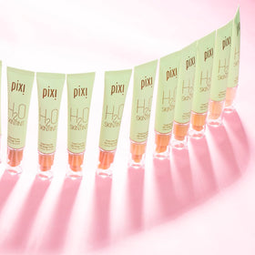 Pixi on model in natural light showing dewy, sun-kissed warm finish