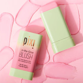 Model dabbing Pixi tint on lips for coordinated cheek-and-lip color
