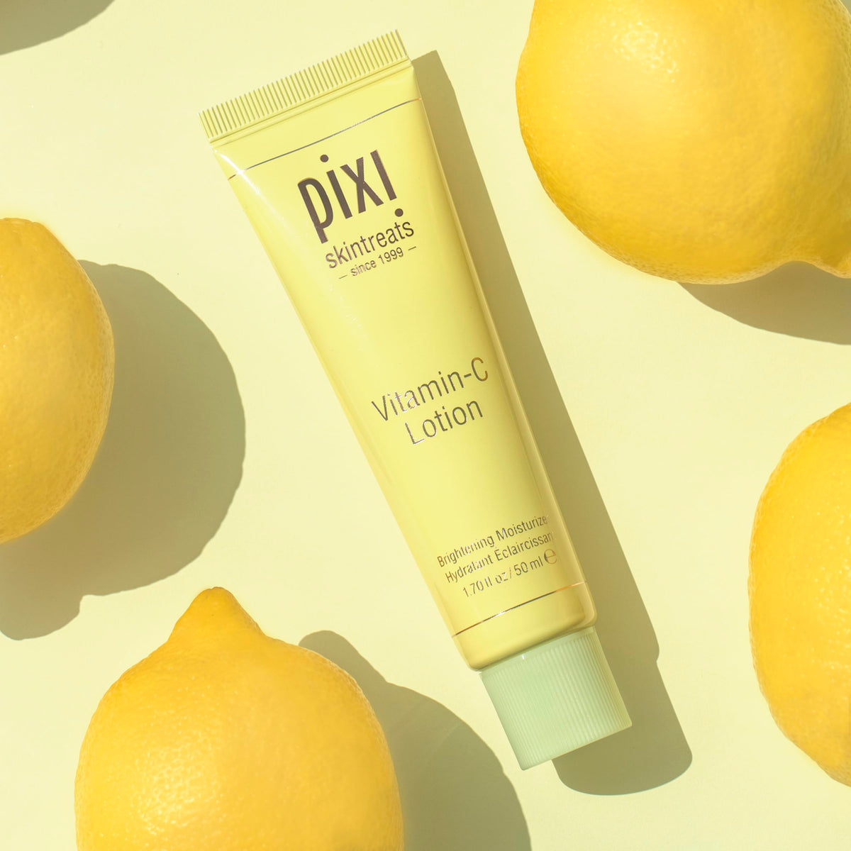Pixi Vitamin-C Lotion on bathroom counter in lifestyle setting demonstrating morning routine