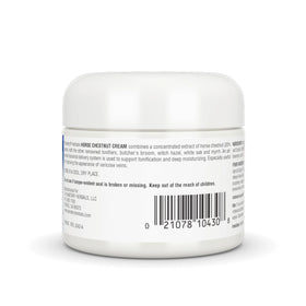 Planetary Herbals 2 oz tube next to ruler showing compact travel-friendly benefit