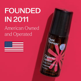 Plant Therapy roll-on in hands illustrating convenient use and easy control