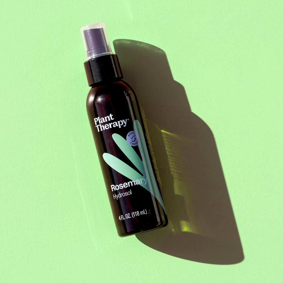 Plant Therapy rosemary hydrosol misting on skin for gentle hydration and tone