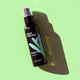 Plant Therapy rosemary hydrosol misting on skin for gentle hydration and tone