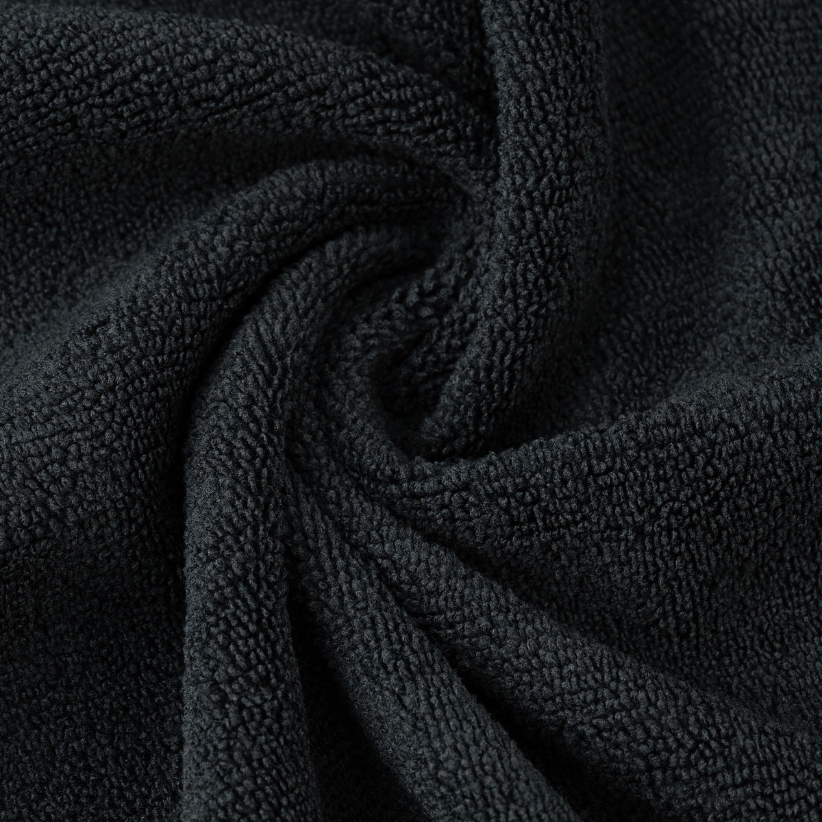 POLYTE towel wrapped around hair demonstrating gentle drying