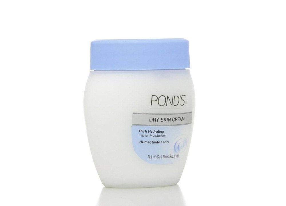 Dove Pond's cream applied to hands showing fast absorption and softness