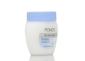 Dove Pond's cream applied to hands showing fast absorption and softness