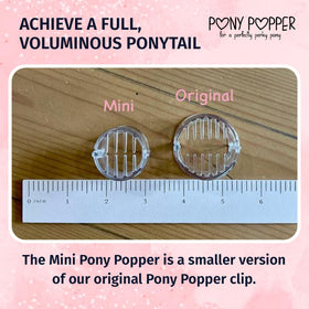 Pony Popper in hand highlighting lightweight convenience
