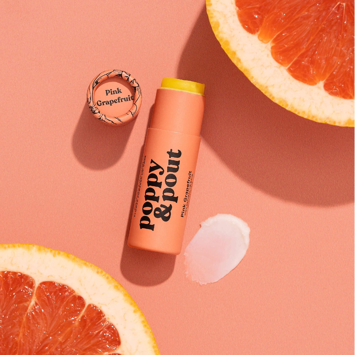 Poppy & Pout beeswax and coconut oil close shot illustrating moisturizing ingredient sources