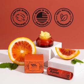Poppy & Pout in hand size comparison showing jumbo tube portability and more product