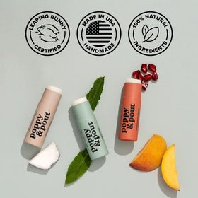 Poppy & Pout natural ingredients display beeswax and coconut oil for moisturizing benefit