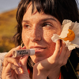 Poppy & Pout close-up beeswax sheen demonstrating protective moisture barrier