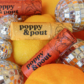Poppy & Pout label closeup highlighting ingredients and cruelty-free certification