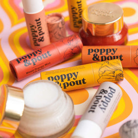 Poppy & Pout store shelf display presenting product assortment and attractive retail presence