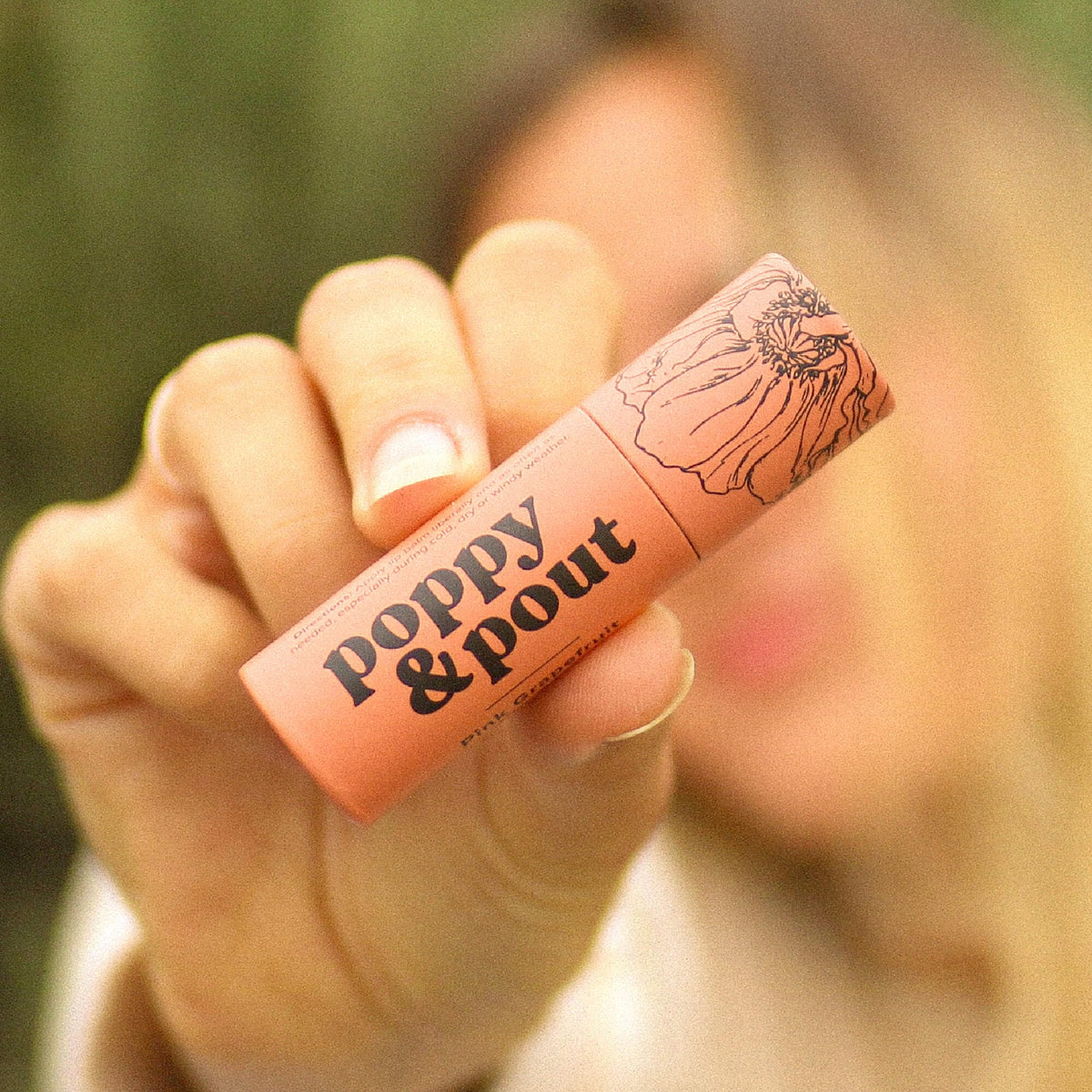 Poppy & Pout texture close-up revealing creamy beeswax finish for lasting hydration