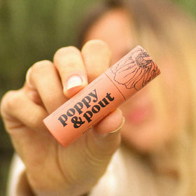 Poppy & Pout texture close-up revealing creamy beeswax finish for lasting hydration