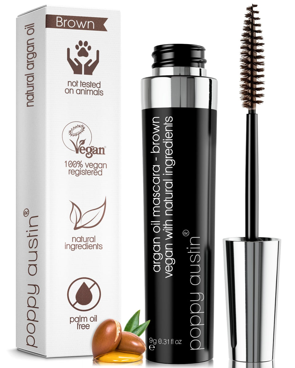 Poppy Austin front tube showing brown mascara packaging and compact size benefit