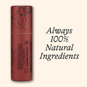 Poppy & Pout tube in hand to show jumbo size and travel convenience
