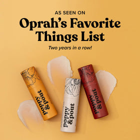 Poppy & Pout ingredients flatlay with beeswax and coconut oil for nourishing care