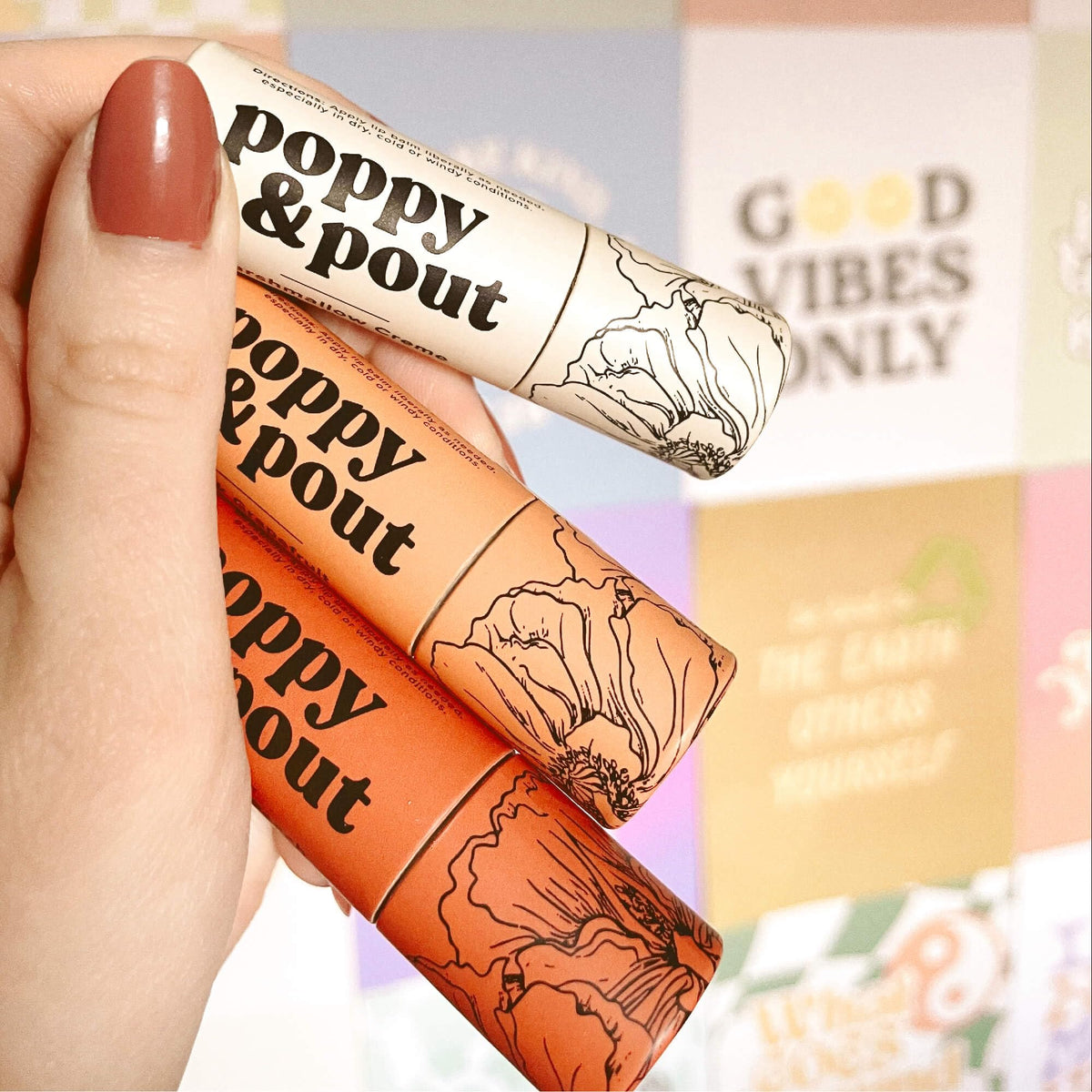 Poppy & Pout recyclable label detail showing instructions and reduced-plastic benefit