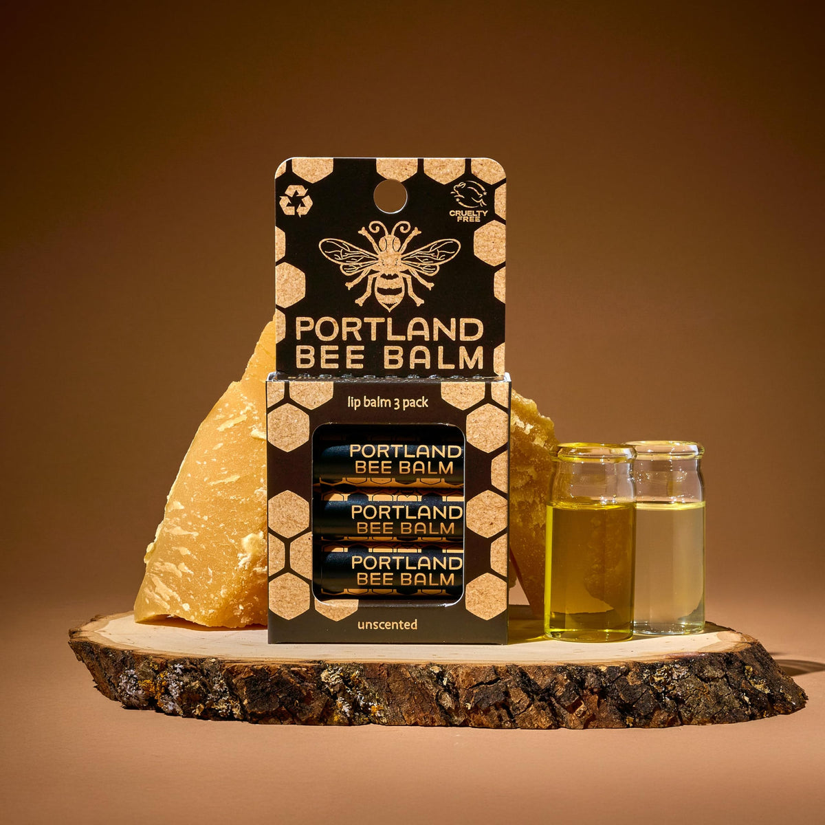 Artisan making lip balm in Portland studio highlighting handmade quality and care