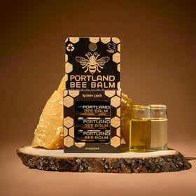 Artisan making lip balm in Portland studio highlighting handmade quality and care