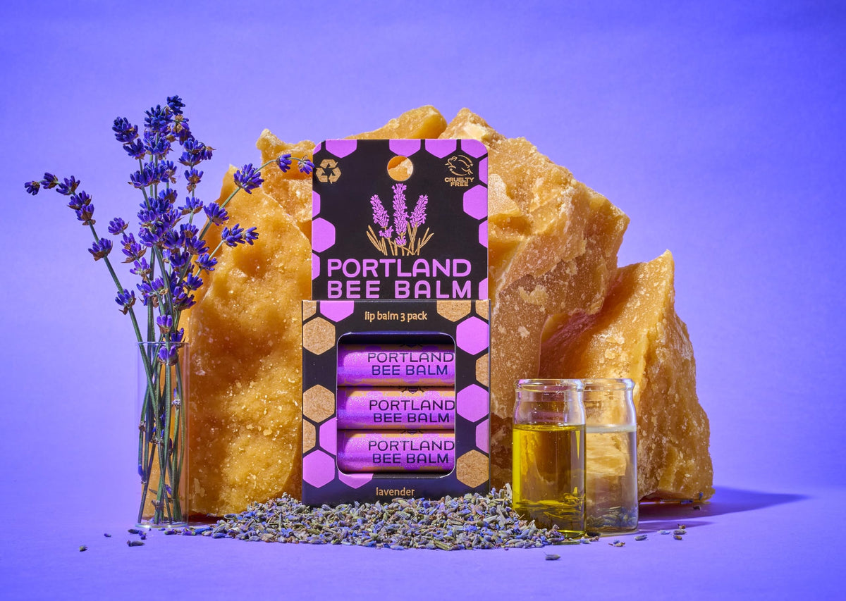 Portland Bee Balm lavender blooms next to balm emphasizing calming scent