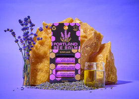 Portland Bee Balm lavender blooms next to balm emphasizing calming scent