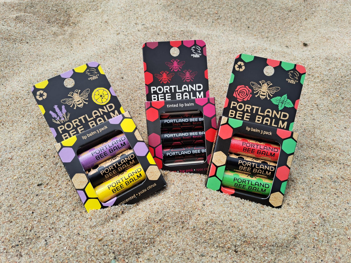 Portland Bee Balm Unscented tube on wooden table demonstrating clean formula and subtle protection