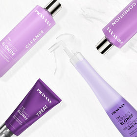 PRAVANA bottle held in hand to show 10.1 fl oz size and scale