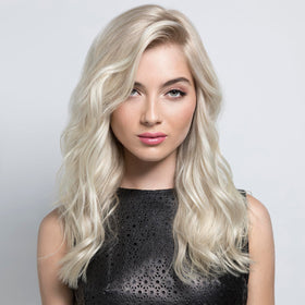 PRAVANA spray applied to damp hair demonstrating easy use