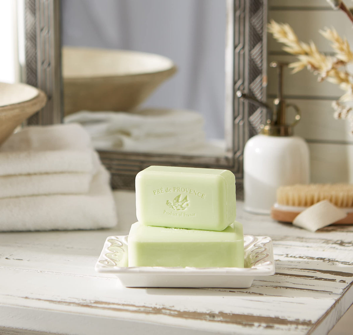 Pre de Provence lather in hand illustrating creamy shea-enriched foam for soft skin