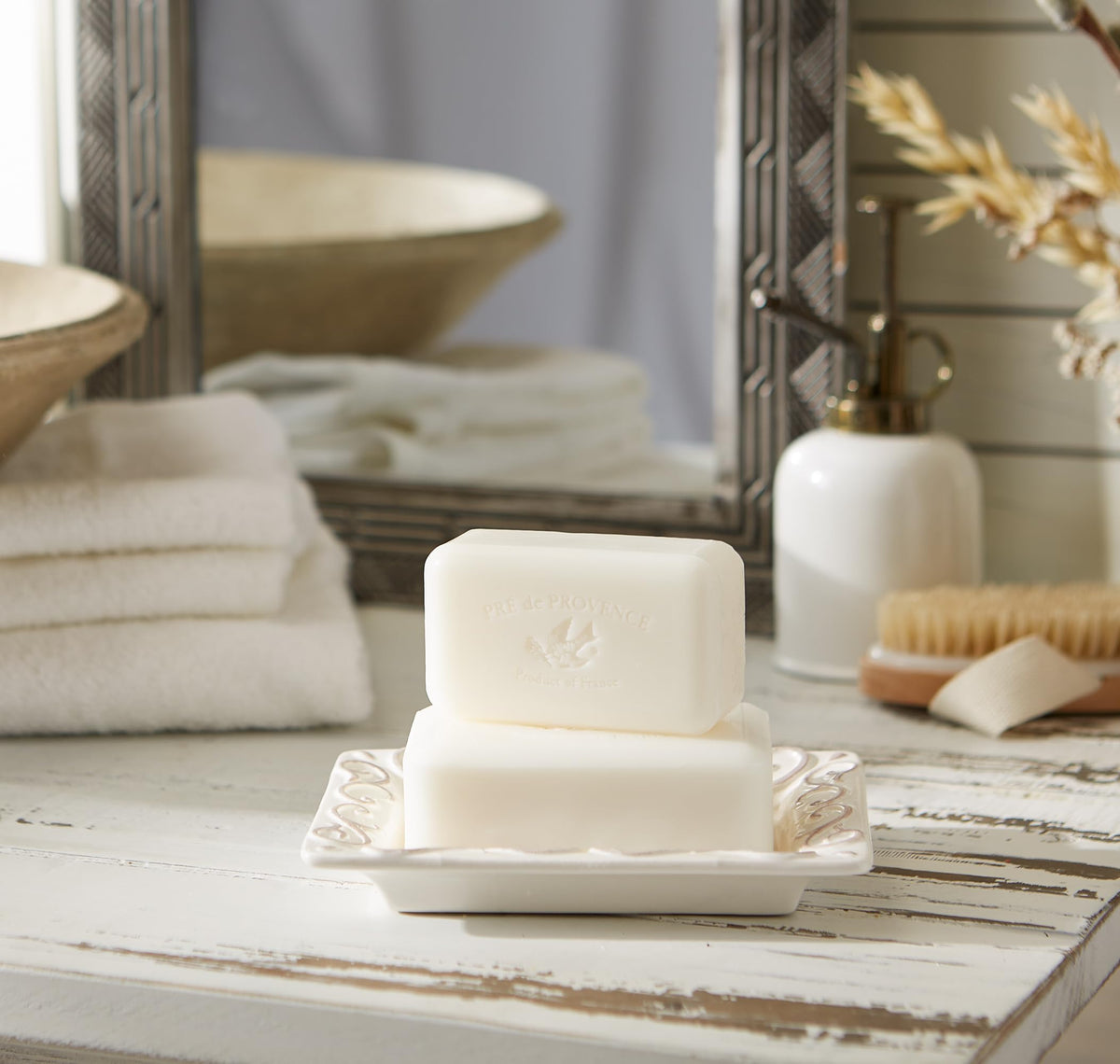 Pre de Provence soap lather in hand demonstrating rich creamy foam benefit