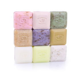Pre de Provence nine soaps arranged flatlay highlighting scent variety and sampling benefit