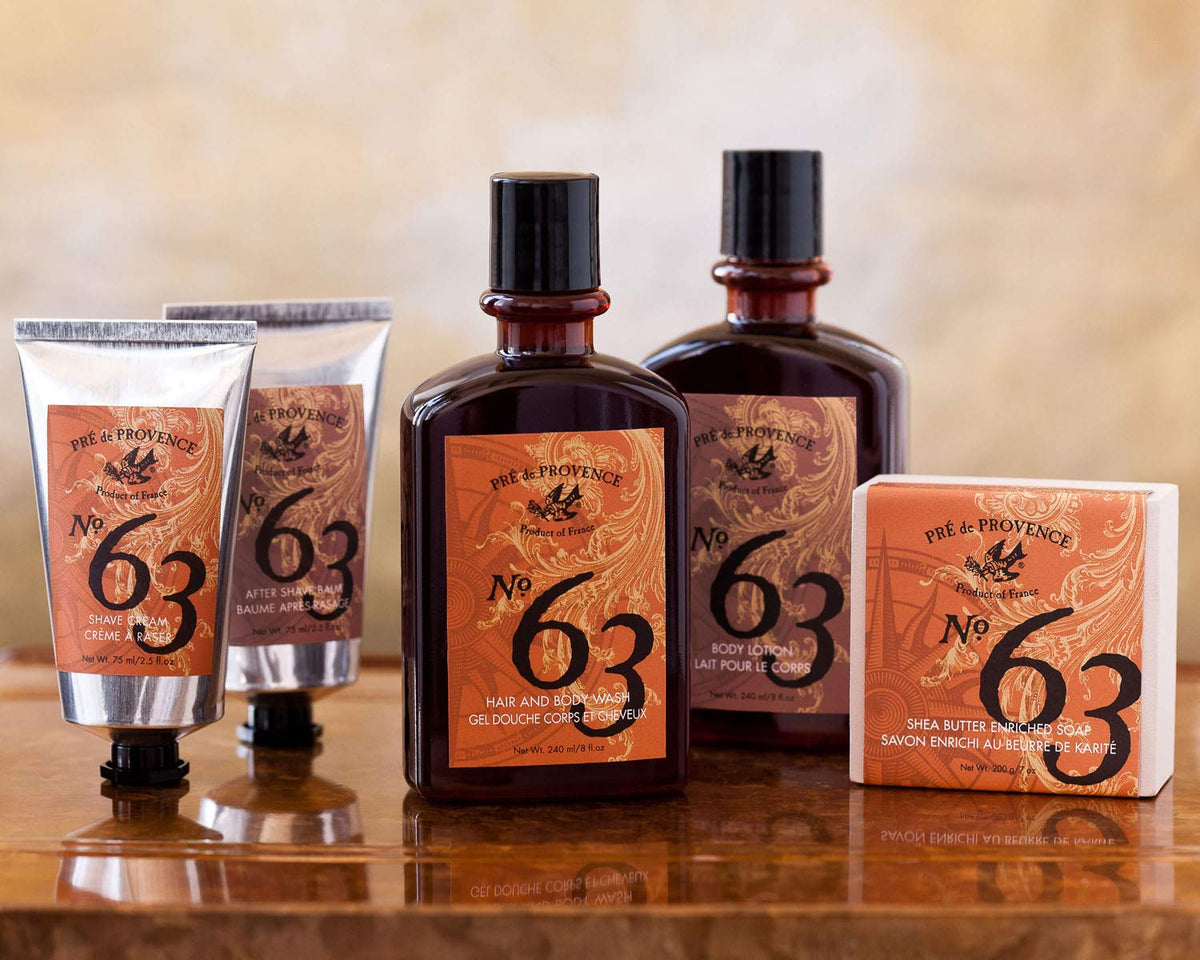Pre de Provence balm held in hand to show bottle size and travel-friendly convenience
